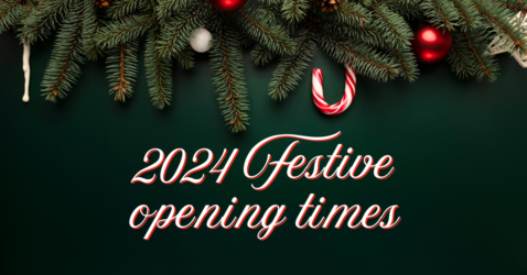 Dark green foliage and candy can with text 2024 Festive opening hours